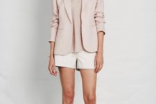 With pale pink shirt, pale pink blazer and white shorts