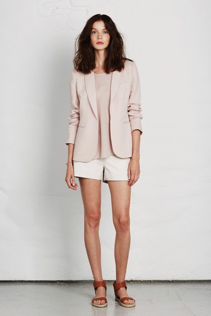 With pale pink shirt, pale pink blazer and white shorts