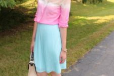 With pleated skirt, beige shoes and two colored bag