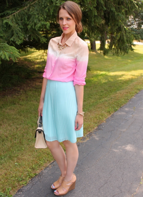 With pleated skirt, beige shoes and two colored bag