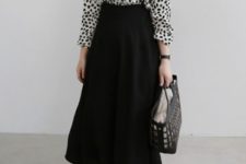 With printed blouse, midi skirt and bag