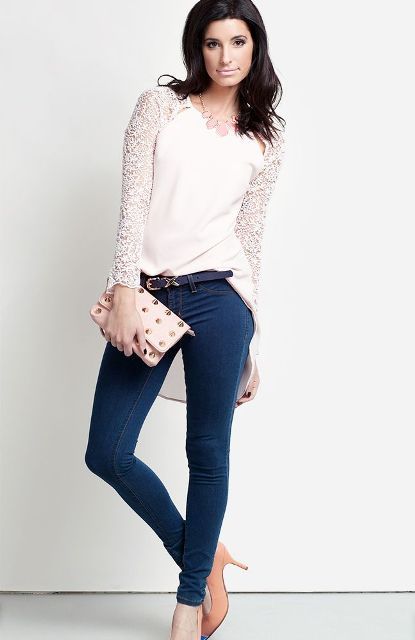 With skinny jeans, pale pink shoes, small clutch and black belt