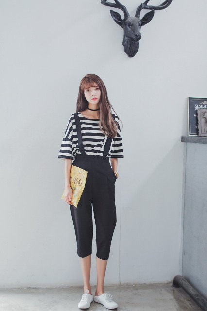 With striped shirt and white sneakers