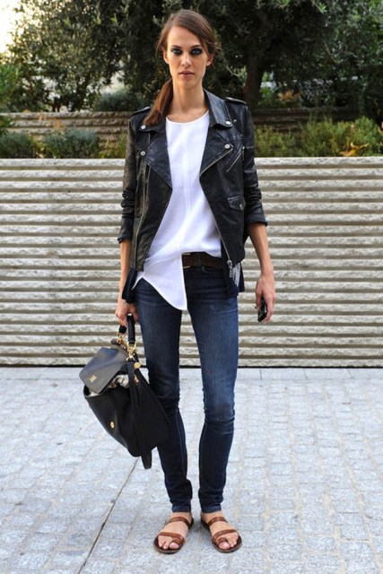 With white blouse, skinny jeans, black leather jacket and black backpack
