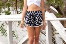 With white crop top and metallic sandals