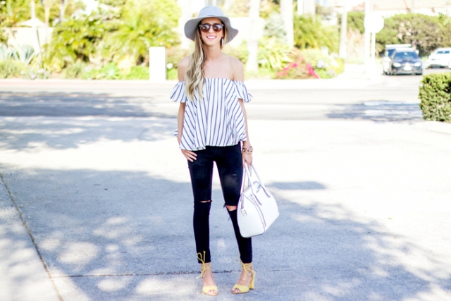 With white hat, yellow sandals, pants and white bag