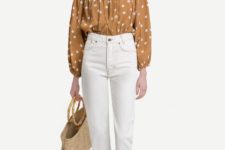 With white jeans, straw bag and beige flat shoes