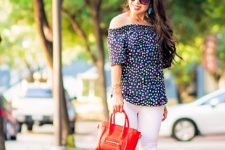 With white pants, yellow high heels and red mini bag