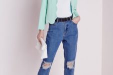 With white shirt, black belt, distressed jeans, white clutch and pumps