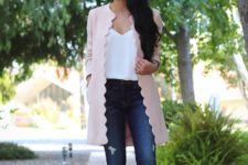 With white top, jeans and pale pink cutout boots