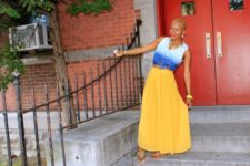 With yellow maxi skirt and flat sandals