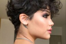 a bold black wavy pixie with a lot of volume and longer bangs is a very beautiful and eye-catching idea to try