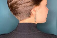 a brown long pixie on thick hair, the short length and stacked effect are a great combo for anyone with such hair