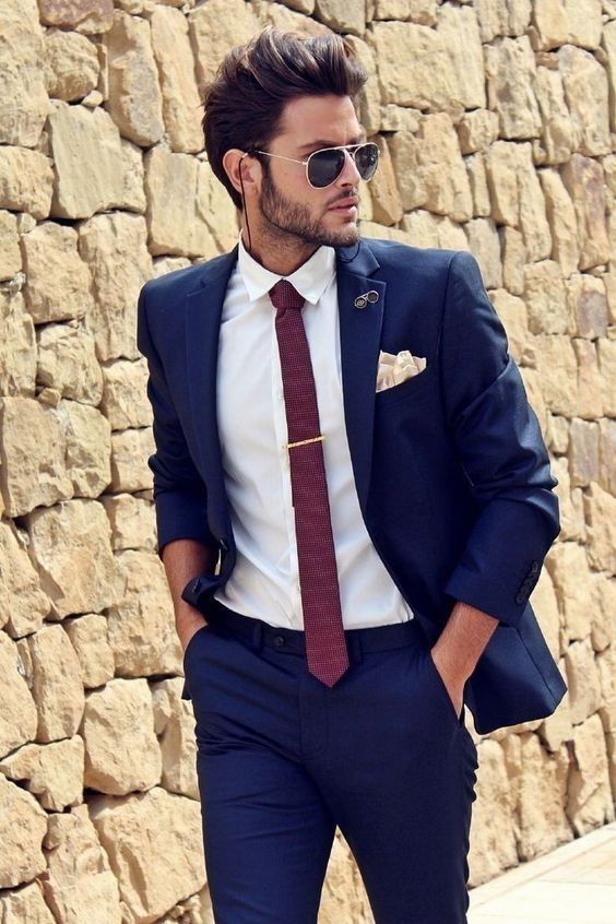 a classic graduation look with a navy pantsuit, a white button down, a burgundy tie is always a good idea that works
