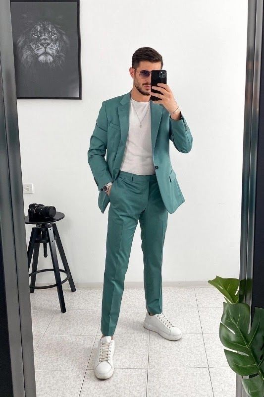 a cool business casual look with a green pantsuit, a white tee and white sneakers is a stylish idea for graduation
