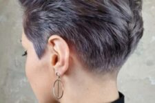 a lilac long pixie looks super bold due to the shaved sides, and its styling can be very versatile