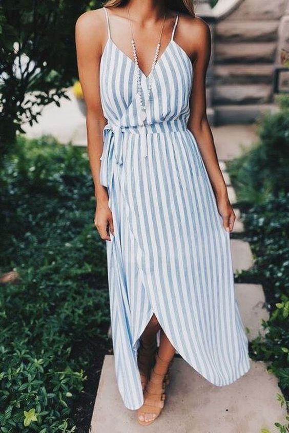 a striped spaghetti strap wrap midi dress and nude sandals are all you need for comfort