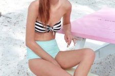 12 a retro inspired swimsuit with a strapless striped top and a mint high waisted bottom