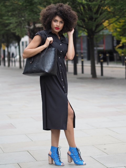 With black shirtdress and blue cutout shoes