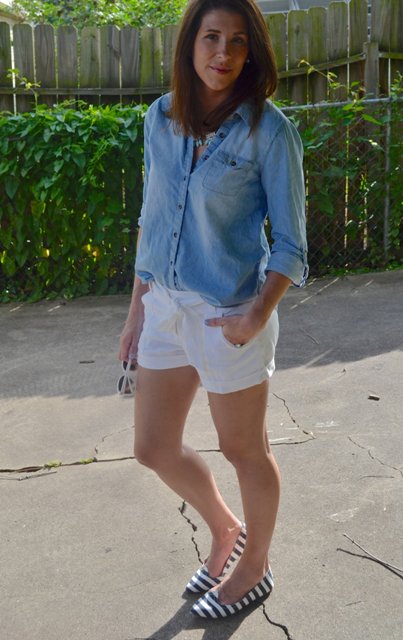 With denim shirt and white shorts