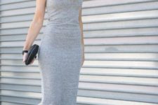With gray midi dress and black clutch