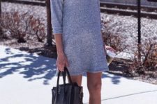 With gray mini dress and black tote