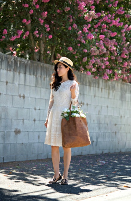 With lace dress, hat and flat shoes