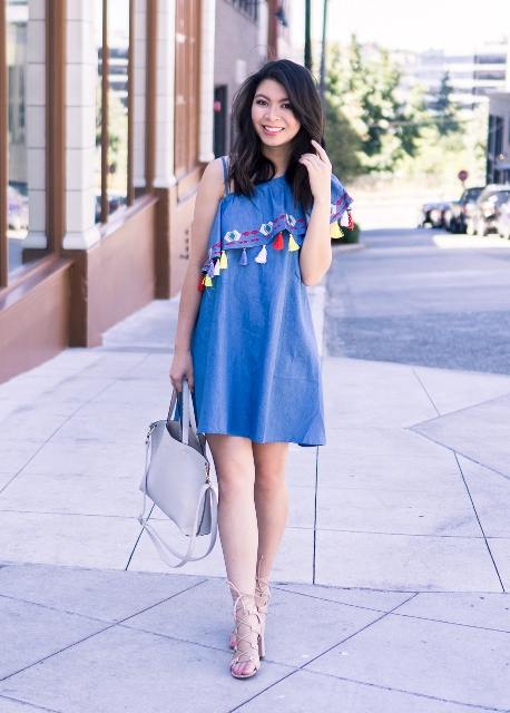 With light gray bag and lace up sandals