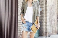 With loose shirt, button down shirt, clutch and white sandals
