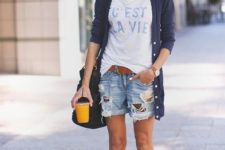 With loose t-shirt, navy blue cardigan, white sneakers and bag