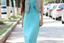 With maxi dress and denim vest