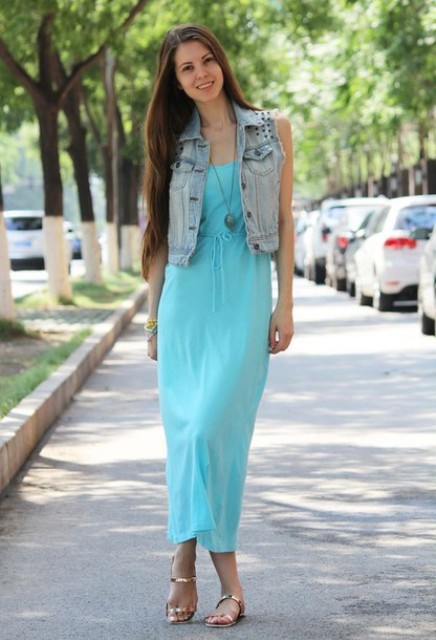 With maxi dress and denim vest