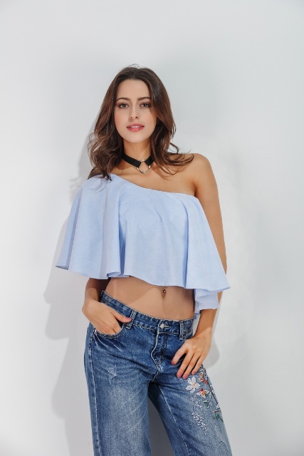 With necklace and jeans