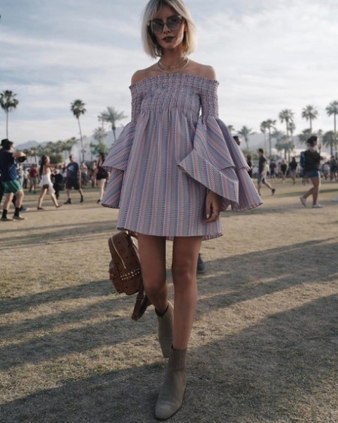 With off the shoulder dress and gray boots