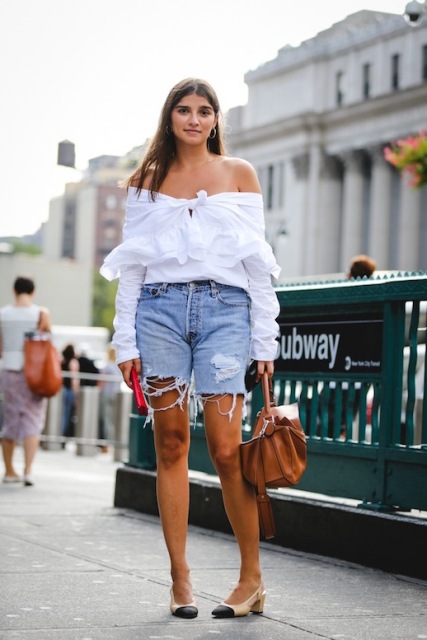With off the shoulder shirt, brown bag and two colored shoes
