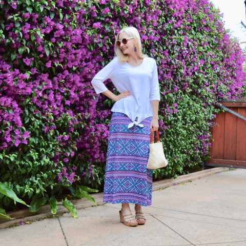 With printed maxi skirt, platform shoes and white and red bag