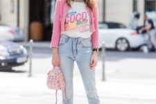 With printed t-shirt, jeans, pink blazer and yellow pumps