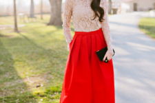 With red midi skirt, beige pumps and black clutch