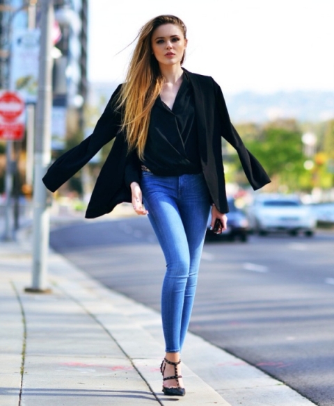 With skinny jeans, black blazer and shoes