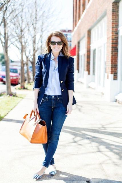 With striped shirt, navy blue jacket, skinny jeans and bag