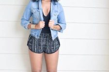 With top, denim jacket and flat sandals