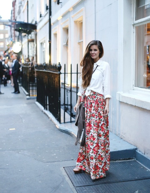 With white button down shirt, fringe bag and platform shoes