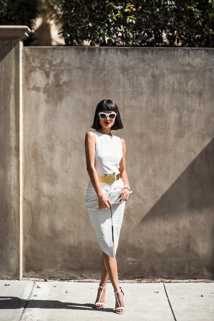 With white dress, white clutch and white sandals