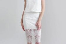 With white lace skirt and beige shoes