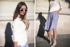 With white shirt and striped skirt