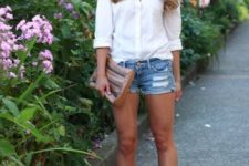 With white shirt, black pumps and clutch