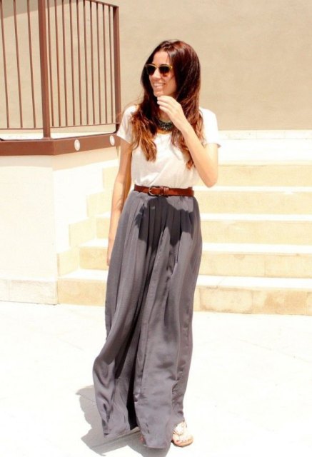 With white t-shirt, brown leather belt and flat sandals