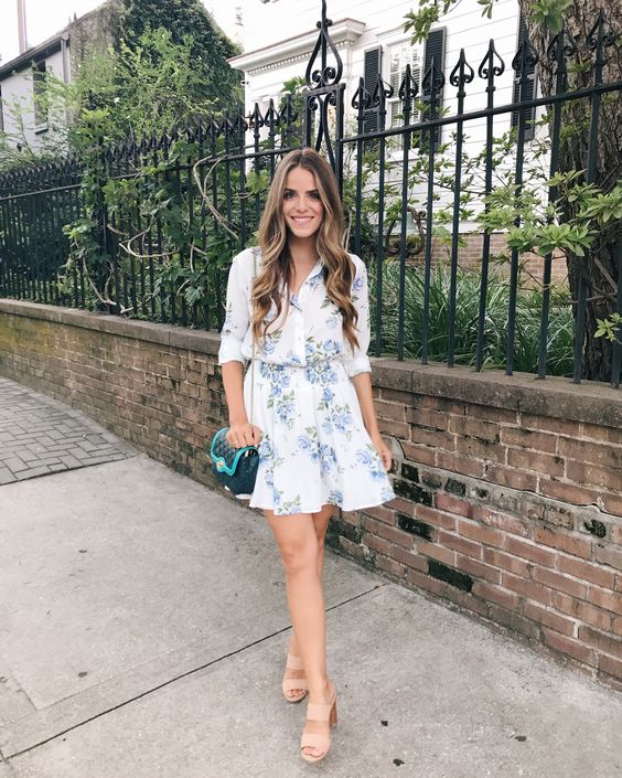 a cute floral shirtdress in blue and white, tan shoes and an emerald bag for a light summer feel