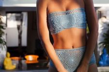 09 a blue crochet bikini set with a bandeau top and a high waisted bottom