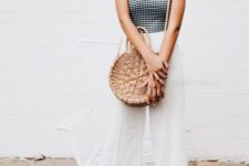 11 a gingham black and white top, white culottes, white heels and a round wicker bag